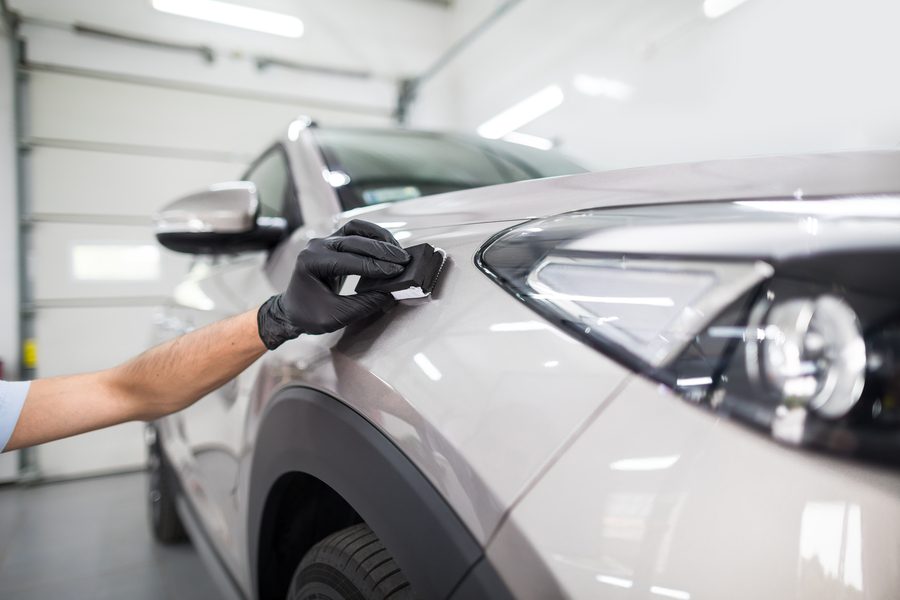Car,Detailing,-,Man,Applies,Nano,Protective,Coating,To,The